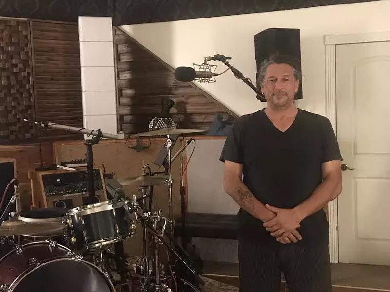 Image: Curtis Grippe is almost like another piece of studio equipment, but that's not a mic growing out of his head.