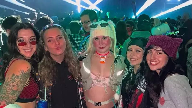 Image: Young women at a music festival.