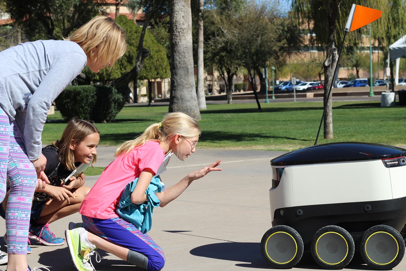 Schoolchildren touring the State Capitol on Wednesday were captivated by a delivery robot that might soon rove Valley sidewalks.