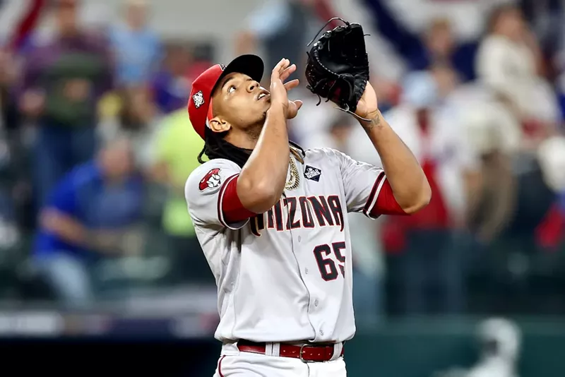 Image: Luis Frías of the Arizona Diamondbacks celebrates after beating the Texas Rangers 9-1 in Game Two of the World Series in Arlington, Texas on Saturday.