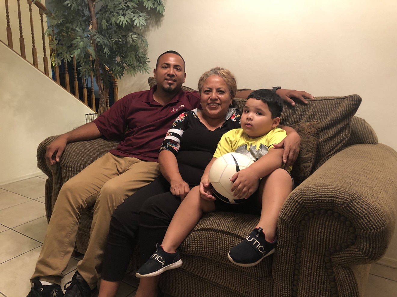Jose Velazquez Pedrote, a 30-year-old DACA recipient, with his mother, Alba, and youngest son.