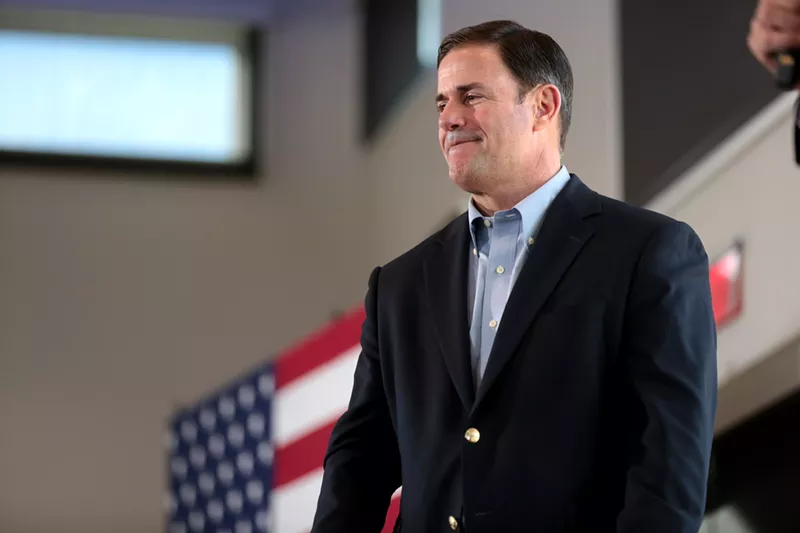 Image: Governor Doug Ducey signed the new proof-of-citizenship bill into law in March.