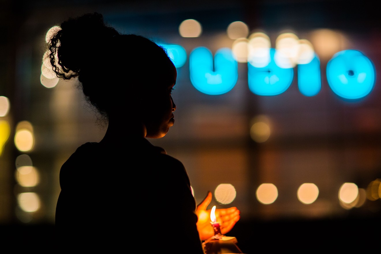 Scene from an October 25, 2015, vigil in Tempe following the death of a woman and her three children at the hands of her estranged husband.