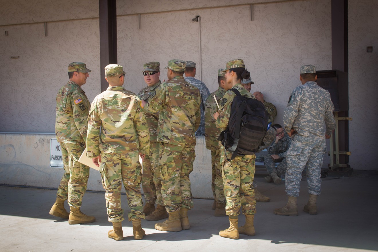 Members of the Arizona National Guard await deployment at Papago Park Military Reservation.