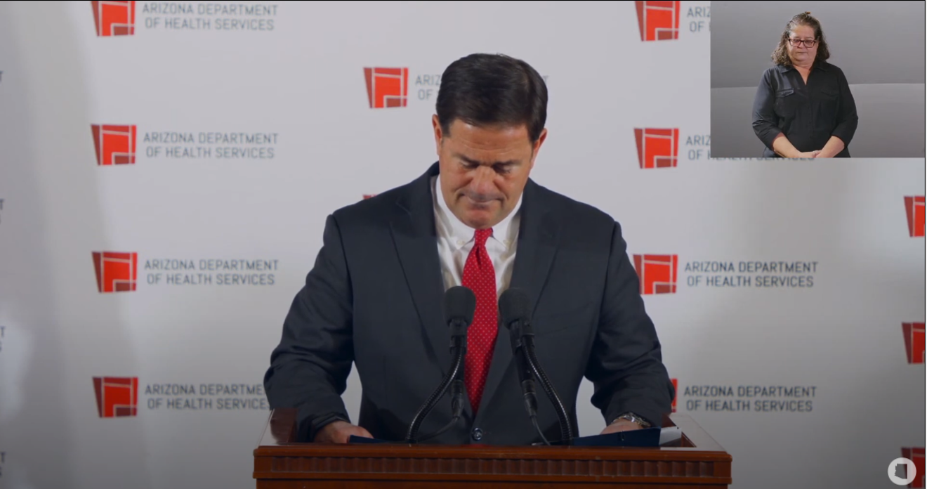 Governor Doug Ducey takes a moment of silence for the more than 6,000 Arizonans killed by COVID-19.