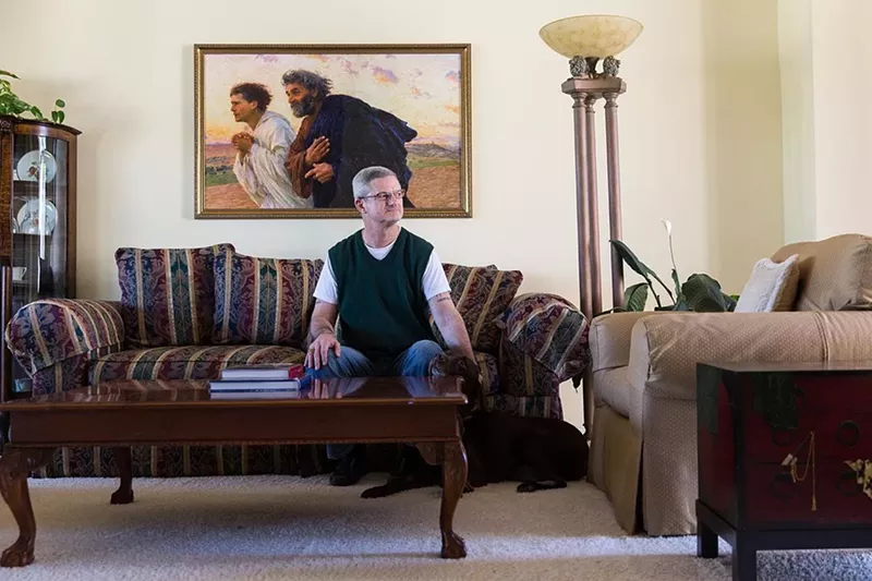 Image: Tim Jeffries at his Scottsdale home with his dog, Buddy.
