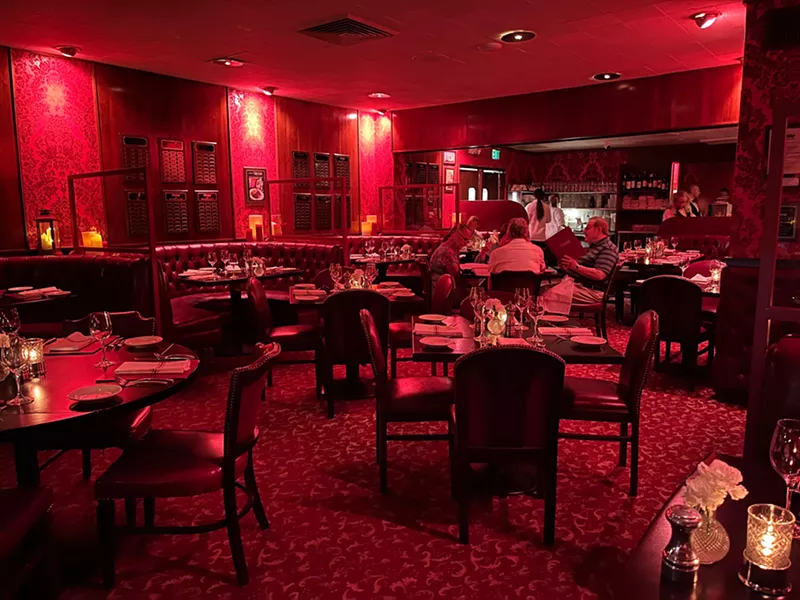 Image: The red-hued dining room has been a staple of Durant's for most of its 75 years. Now, updates are in the works.