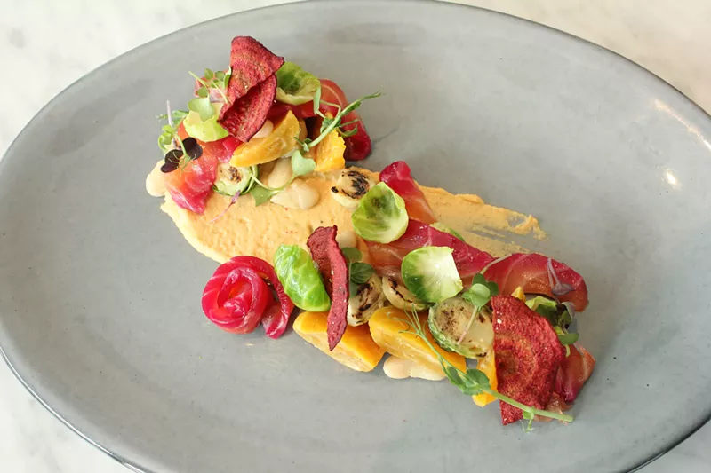Image: Beet-cured steelhead trout swim up the stream.