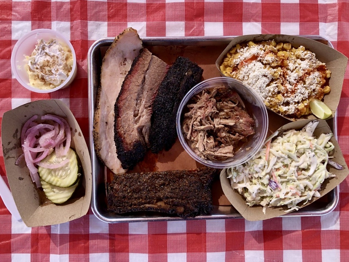 Four meats, two sides, pickles, and banana cream pudding from Eric's Family Barbecue.