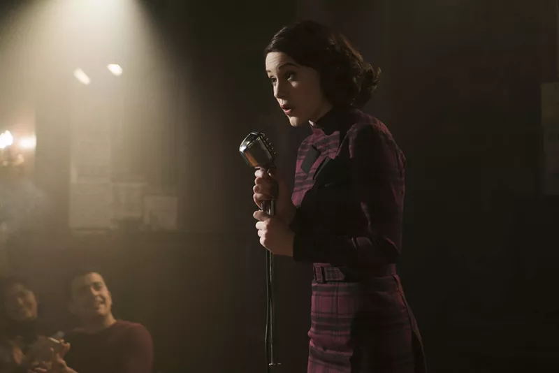 Image: In Amazon's The Marvelous Mrs. Maisel, Rachel Brosnahan plays Midge Maisel, a young Jewish housewife who has her entire life upended and winds up as a stand-up comedian.