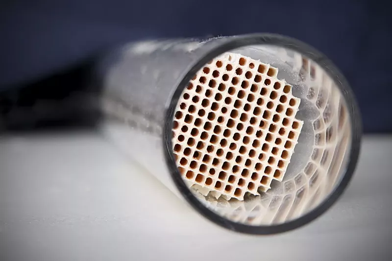 Image: An emissions control device in most tailpipes has replaced copper as the primary target of property crime, according to the Maricopa County Attorney's Office. The metallic part is made of platinum and other precious metals.