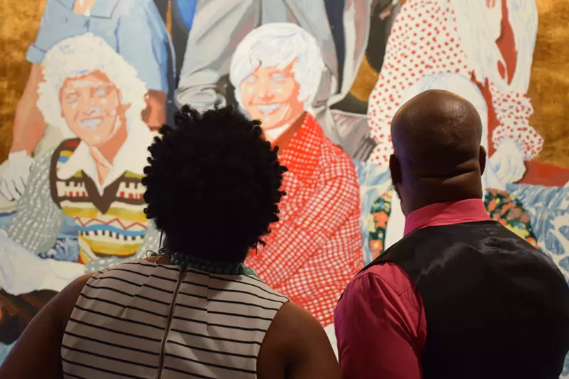 Image: Checking out Randy Slack's Brady Bunch painting at Warehouse215 during the 2017 Art D'Core Gala.