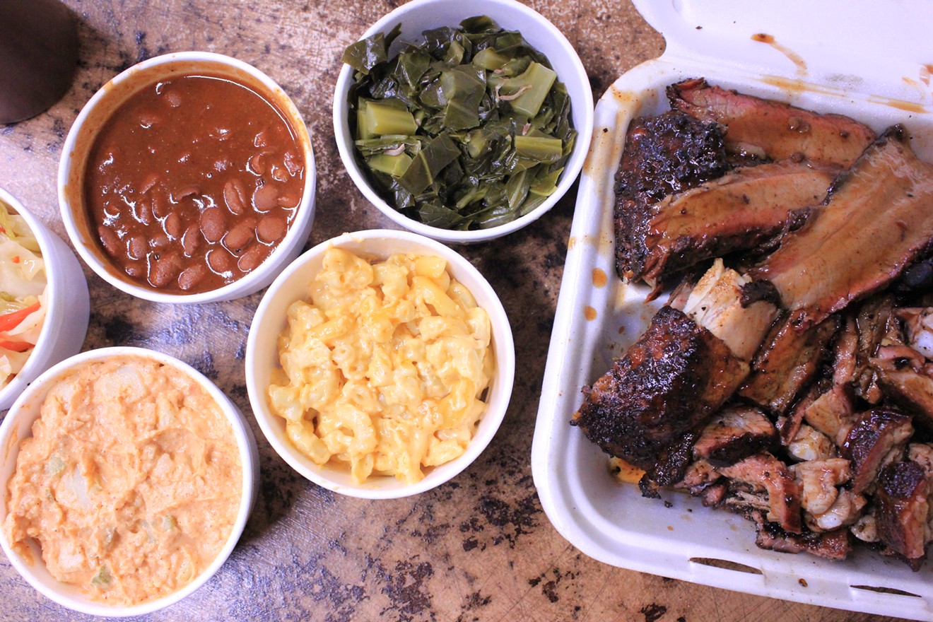 A mixed meat platter and armada of sides from JL Smokehouse.