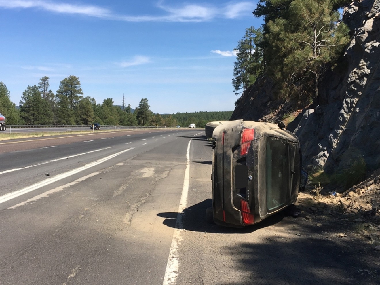 The BMW which a naked man rolled near Flagstaff on I-17 on Sunday, June 18, 2017.