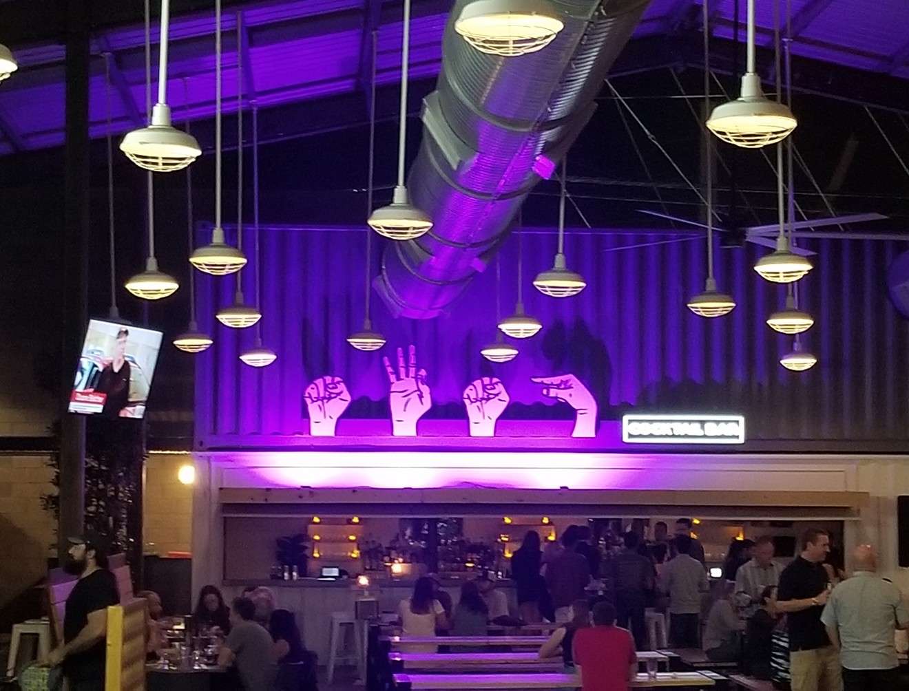 Heed the call of the purple light at So Far, So Good inside The Churchill.