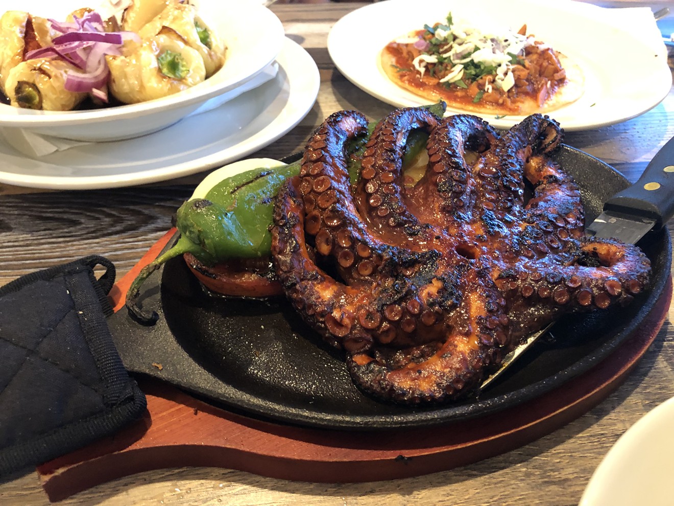 Octopus, marlin-stuffed peppers, and an octopus barbacoa taco from Los Arbolitos in west Phoenix.
