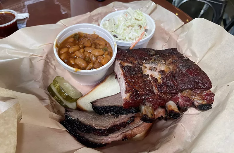 Image: Pork ribs and vinegary Dr. Pepper barbecue beans are among the standouts at Cryin' Coyote BBQ.
