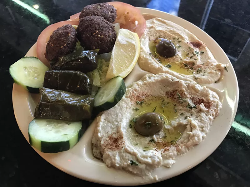 Image: The appetizer combo at Ammos aims to please with its warm falafel, hummus, and baba ghanoush.