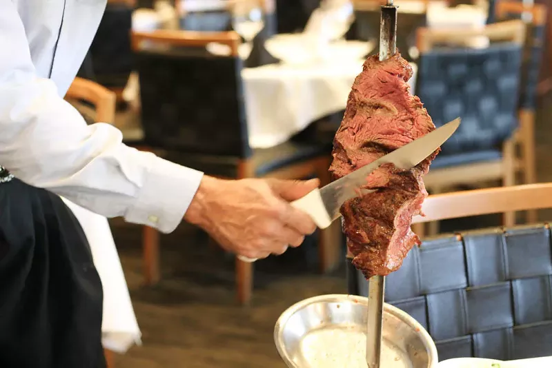 Image: Try slices of meat on swords at Fogo de Chão Brazilian Steakhouse.