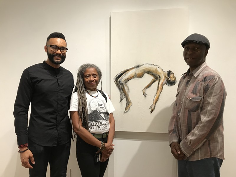 Clottee Hammons (center) and fellow artists who showed work addressing police brutality at Modified Arts in October 2019.