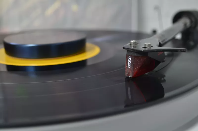 Image: Spinning albums at Record High during Record Store Day.