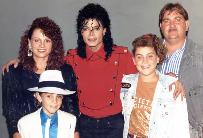 Image: Michael Jackson (center) with the family of Wade Robson: Joy Robson, Wade, Chantal Robson, and Dennis Robson in 1990.