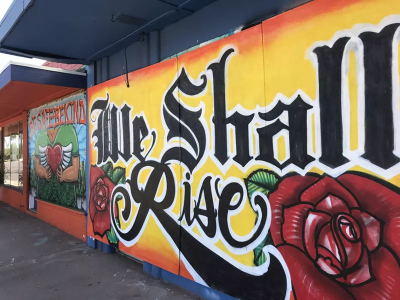 Image: Checking out murals painted at Barrio Cafe on 16th Street.