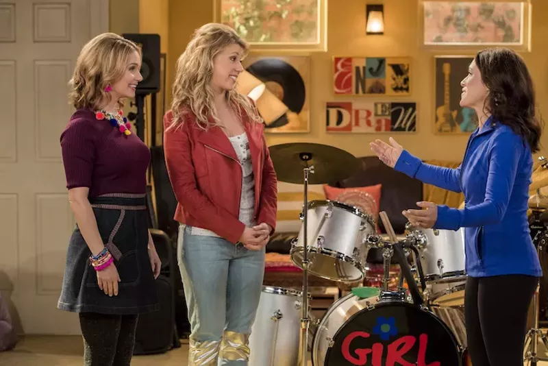 Image: Gia's back, and she's swapped crop tops for a sensible fleece.