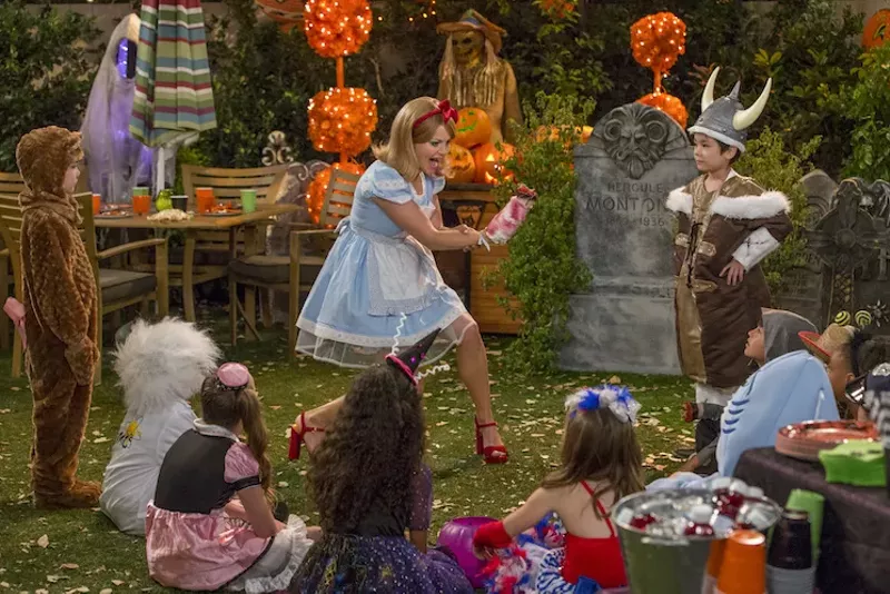Image: DJ tries to repair her Halloween cred (in the least scary costume).