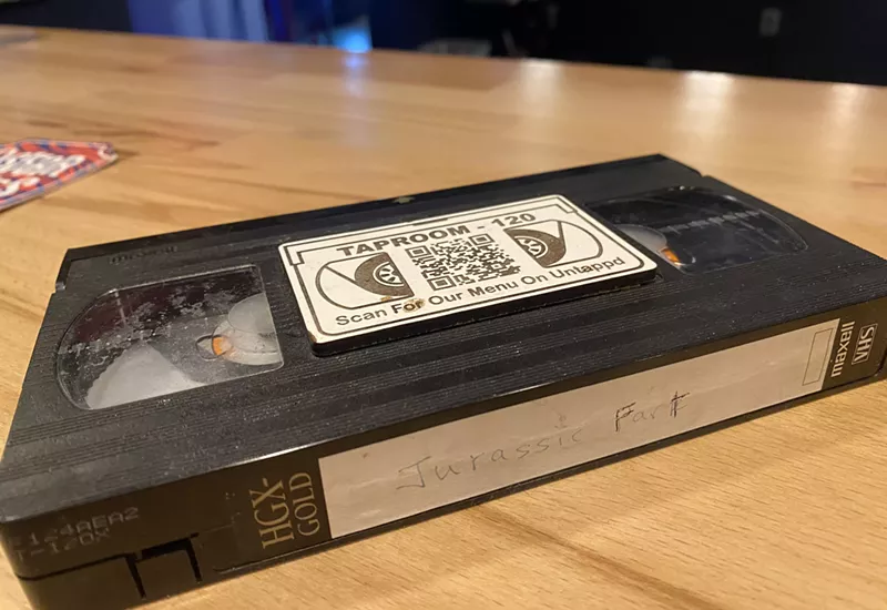 Image: An old VHS cassette that Taproom-120 patrons could scan to get its menu.