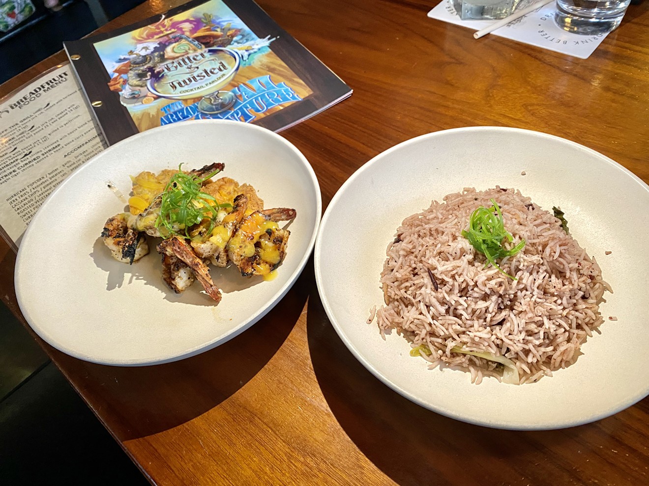 The Breadfruit & Rum Bar has served Jamaican food, including jerk shrimp and rice and peas, inside Bitter & Twisted Cocktail Parlor since September 2022.