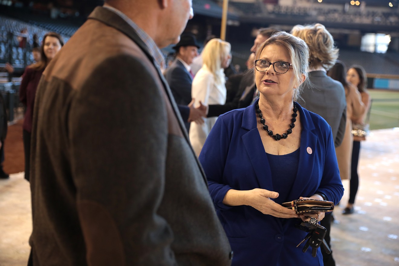 Arizona State Senator Kelly Townsend speaks with an attendee at the 2022 Legislative Forecast Luncheon hosted by the Arizona Chamber of Commerce & Industry at Chase Field in Phoenix.