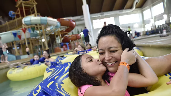 A mother and child at a waterpark.
