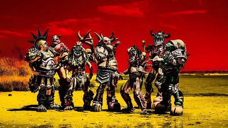 Image: A heavy metal band in costume.