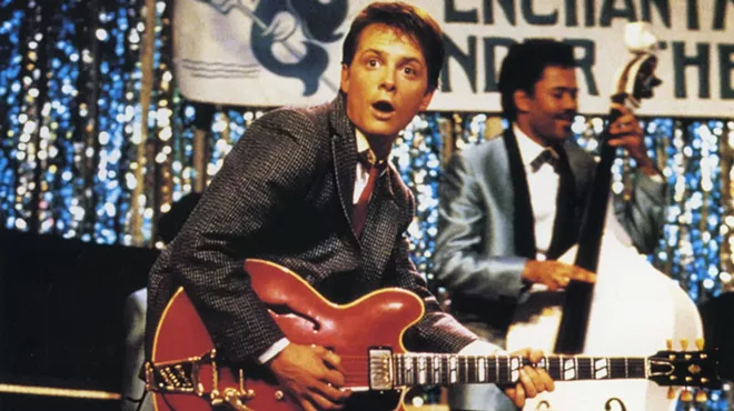Actor plays guitar in movie