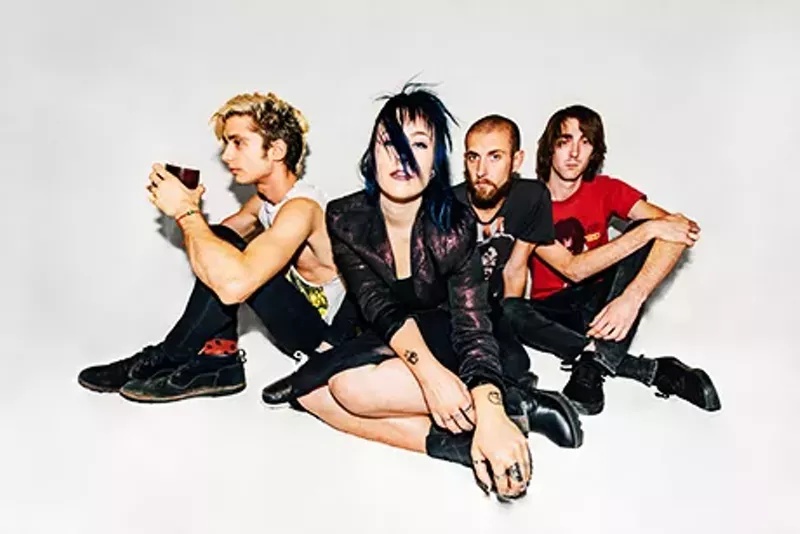 Image: From left to right: Robert Ciuca, Chelsey Louise, Matthew Foos, Ben Foos In a "who's suffering the most" contest, it's no contest. The photographer who said, "Everybody look at me."
