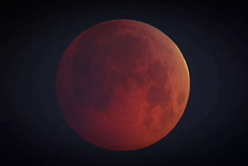 Image: A full moon during a lunar eclipse.