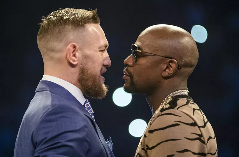 Image: “The Notorious” Conor McGregor (left) and Floyd “Money” Mayweather face off this Saturday.