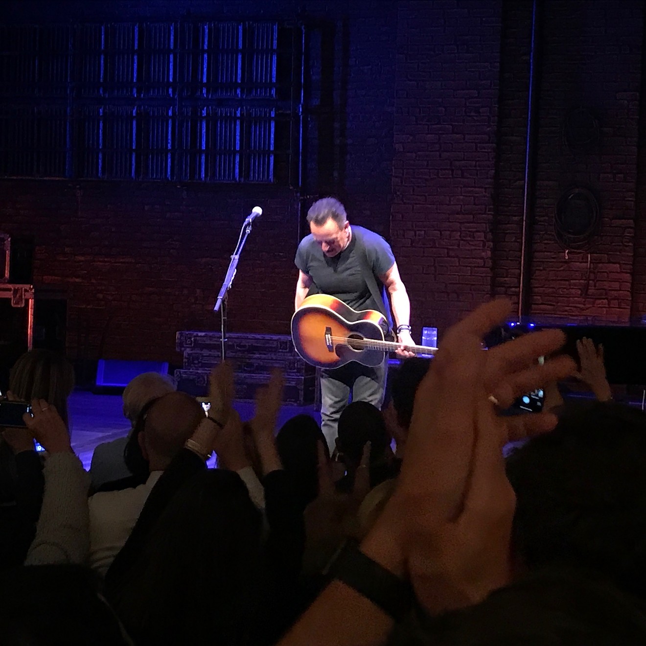 Bruce Springsteen invites audience members to take photos after his Broadway performances.
