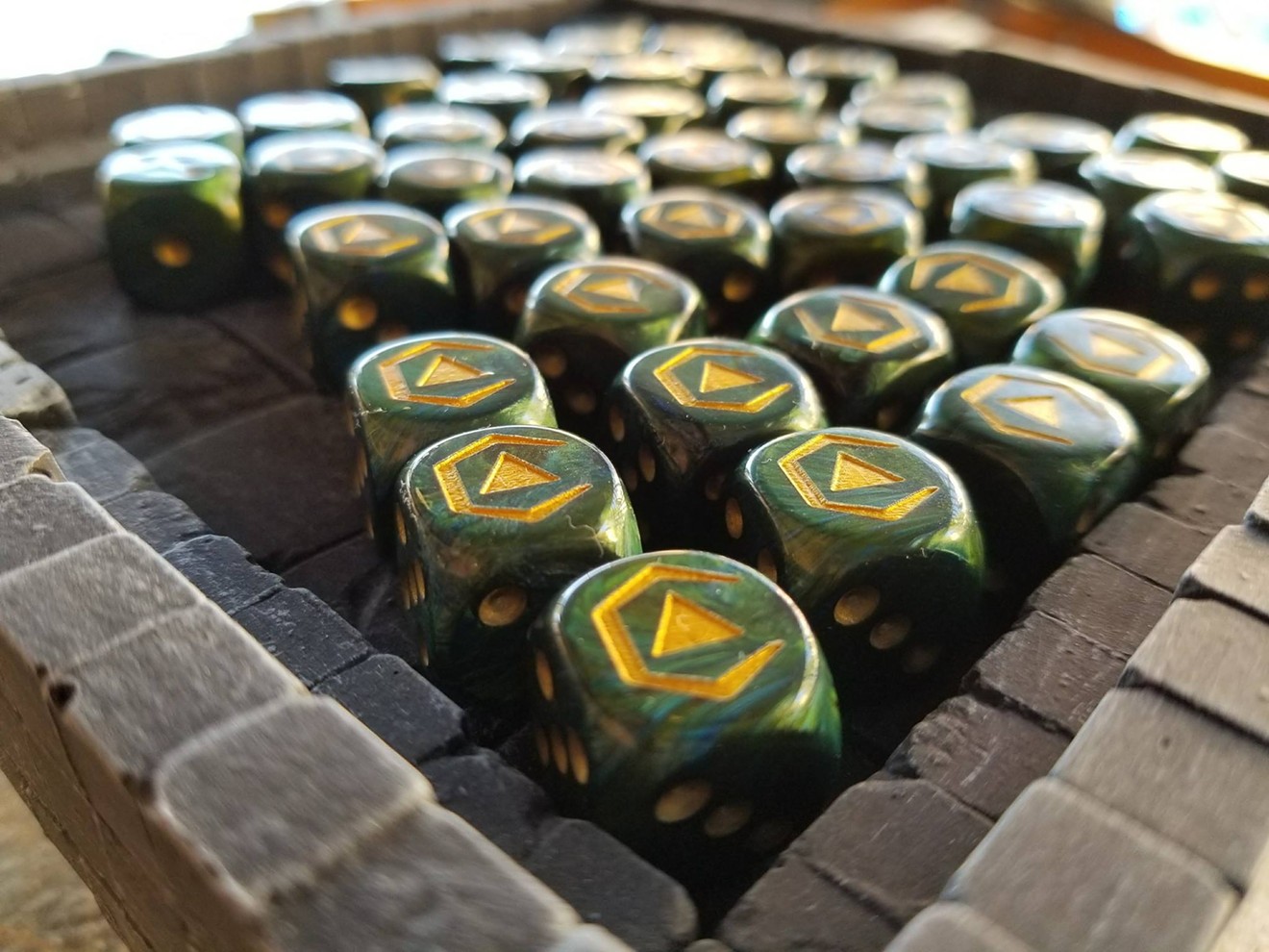 The con's official dice.