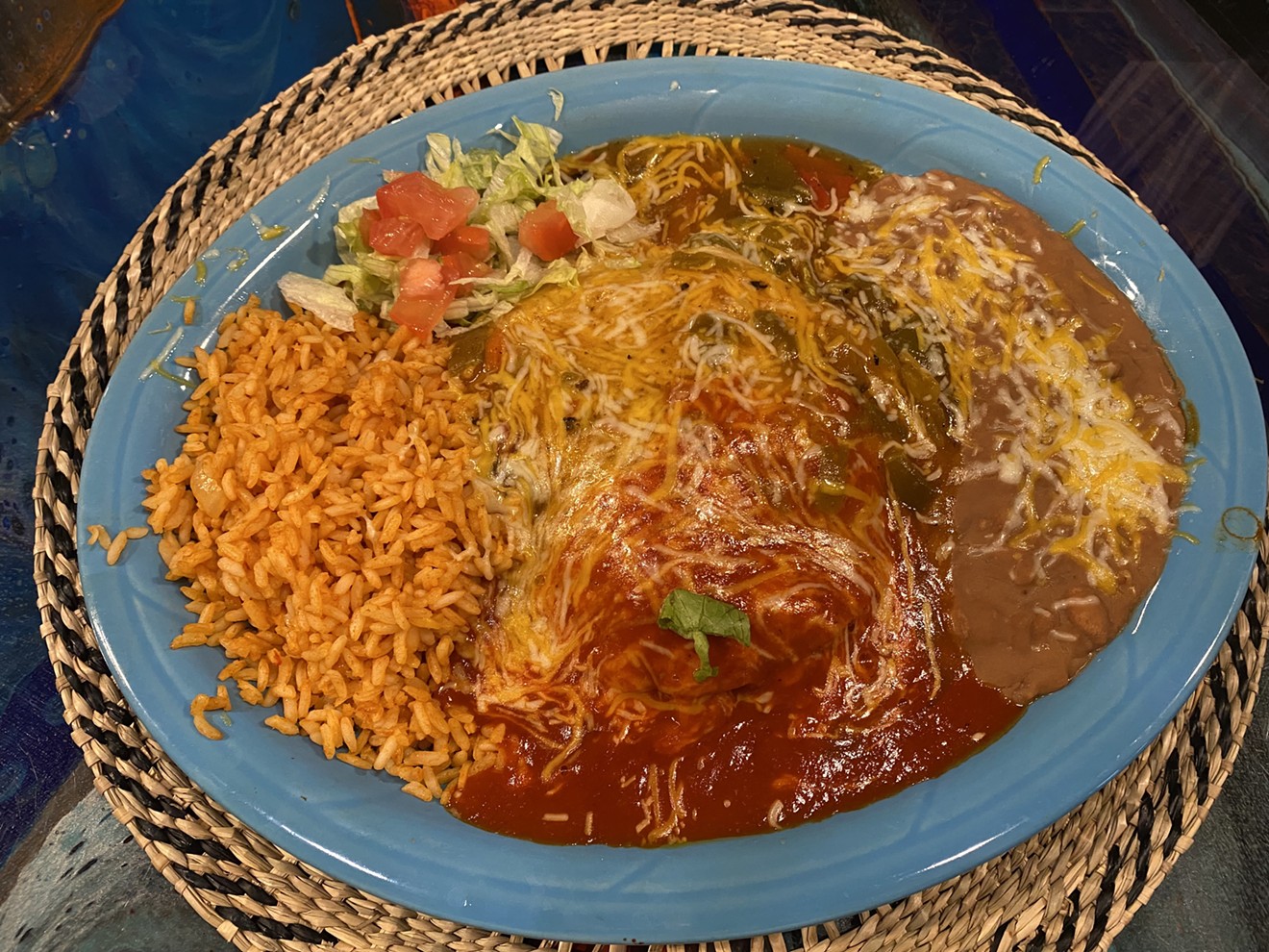 The No. 2 combination plate includes a cheese enchilada, tamale, beef taco, chile relleno, and guacamole.