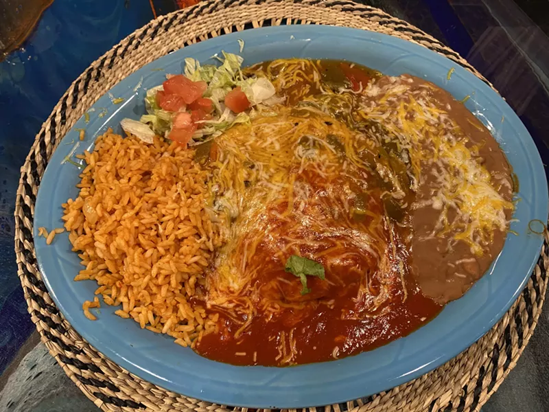 Image: The No. 2 combination plate includes a cheese enchilada, tamale, beef taco, chile relleno, and guacamole.