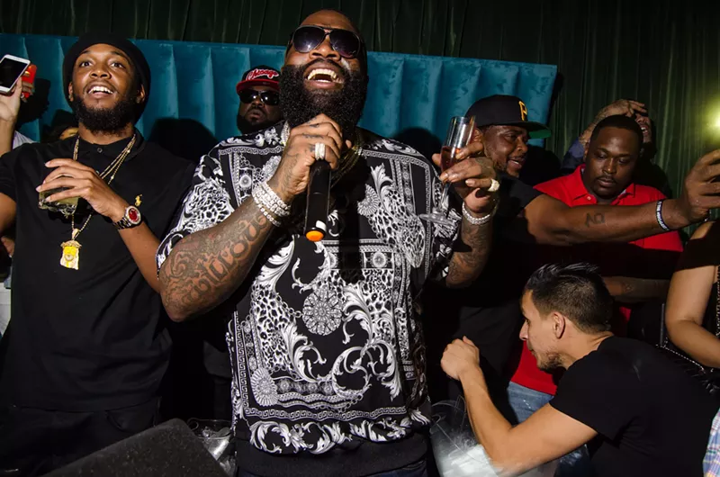 Image: Rick Ross (center) during a Miami appearance in 2018.