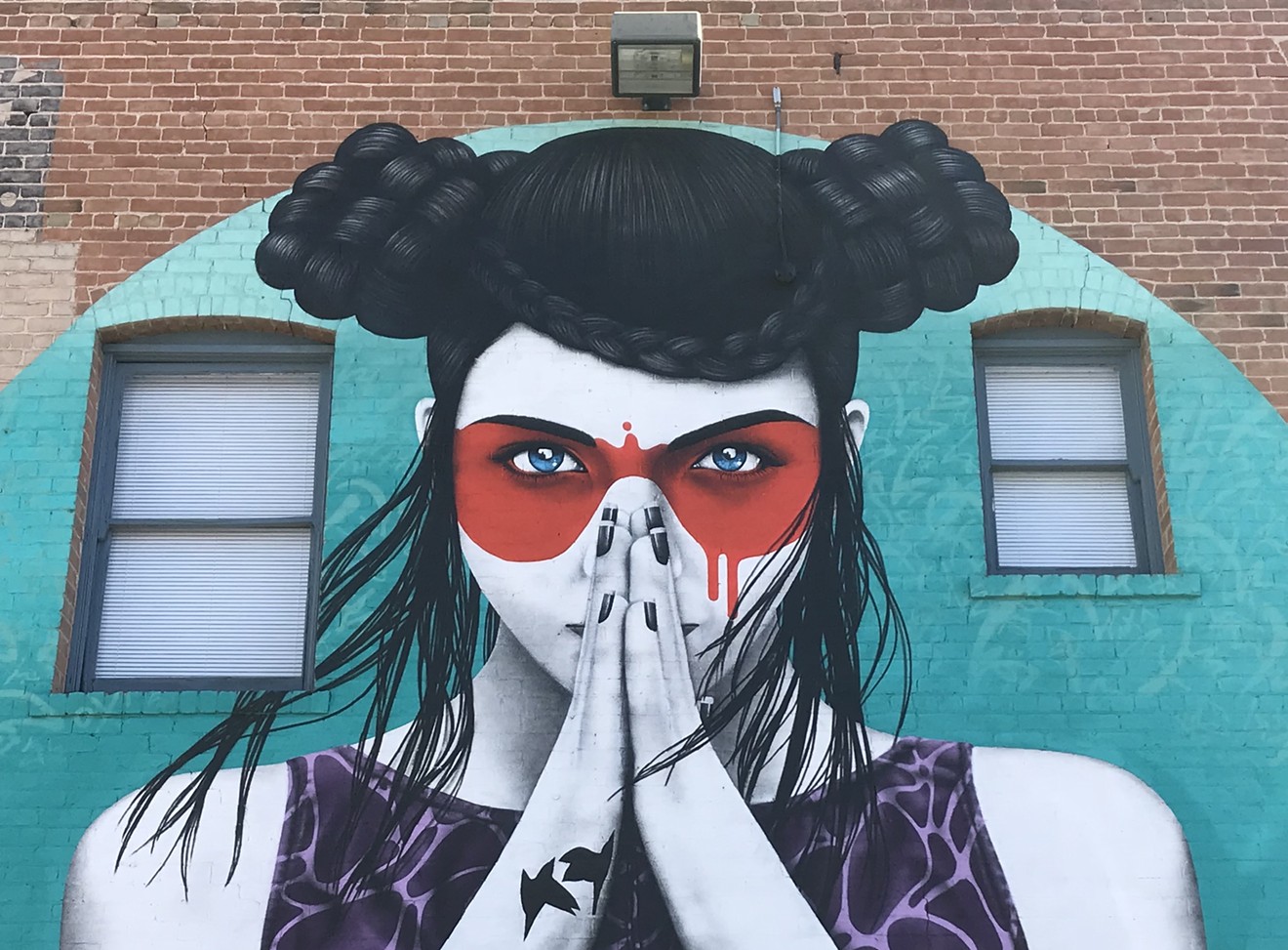 Check out this mural painted by Fin Dac near Etherton Gallery in Tucson.