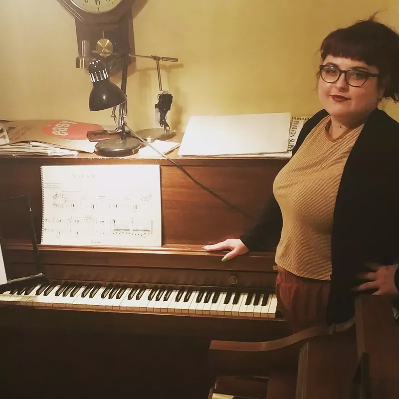 Image: Alicia with her favorite piano.