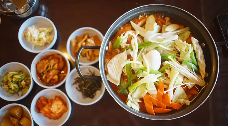 Image: The Dduk Bok E Jungol casserole at Hodori in Mesa is cooked at the table and easily feeds two.