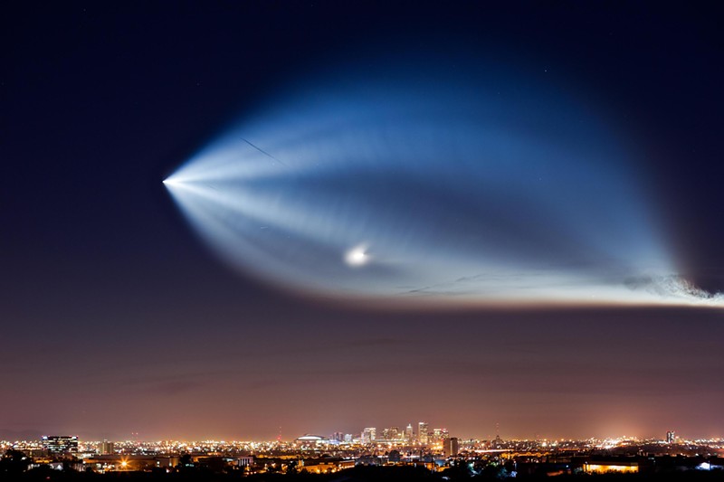 A Falcon 9 rocket launch from Vandenberg Air Force Base viewed over downtown Phoenix in December 2017.