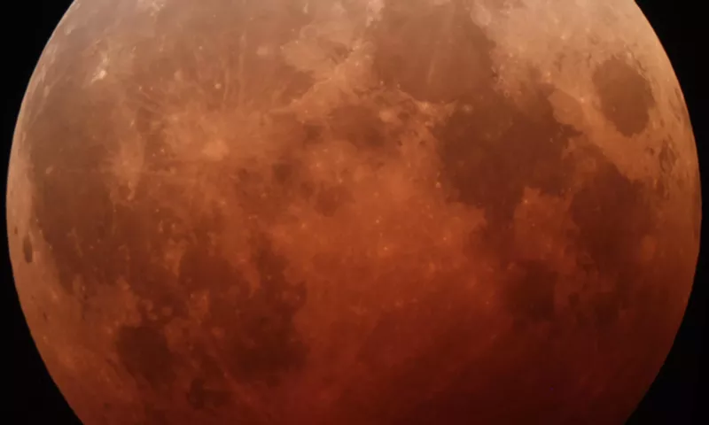 Image: Be sure to check out the total lunar eclipse on Sunday night — it'll be the last one visible in North America until 2021.