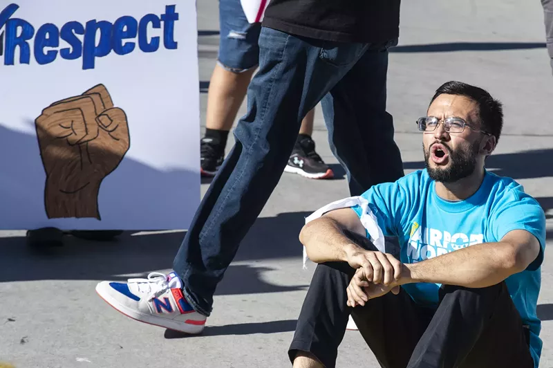 Image: Worker arrested, protest