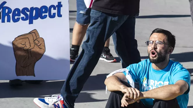Worker arrested, protest